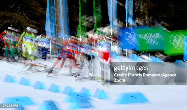 Simon Eder of Austria competes in the men's biathlon 15 km mass start on day 10 of the 2010 Vancouver Winter Olympics at Whistler Olympic Park...