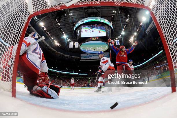 Alexander Ovechkin of Russian Federation celebrates as the puck crosses the line for a third period goal scored by Evgeni Malkin against goalie...