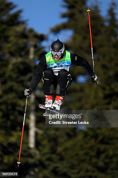 Michael Schmid of Switzerland competes in a men's ski cross race on day ten of the Vancouver 2010 Winter Olympics at Cypress Mountain Resort on...