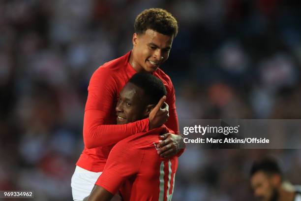 Danny Welbeck celebrates scoring his goal with Deli Alli during the International Friendly match between England and Costa Rica at Elland Road on...