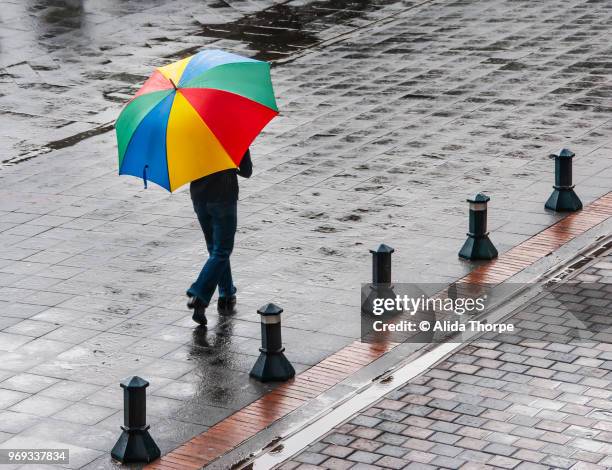 rain in the city - alvida stock pictures, royalty-free photos & images