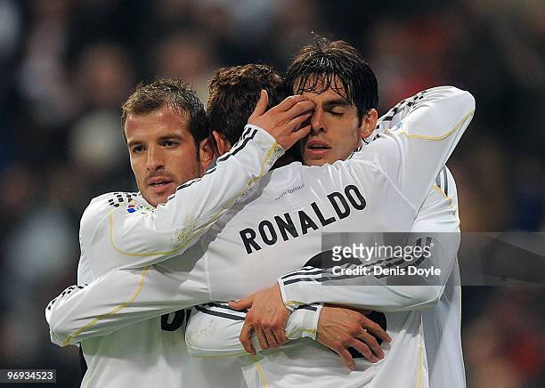 Kaka of Real Madrid celebrates with Cristiano Ronaldo and Rafael Van Der Vaart after scoring Real's sixth goal during the La Liga match between Real...
