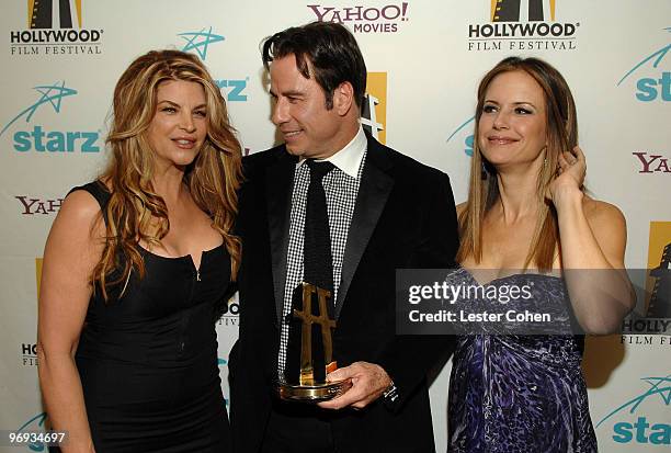 Actress Kirstie Alley, actor John Travolta and actress Kelly Preston backstage at Hollywood Film Festival's Hollywood Awards at the Beverly Hilton...