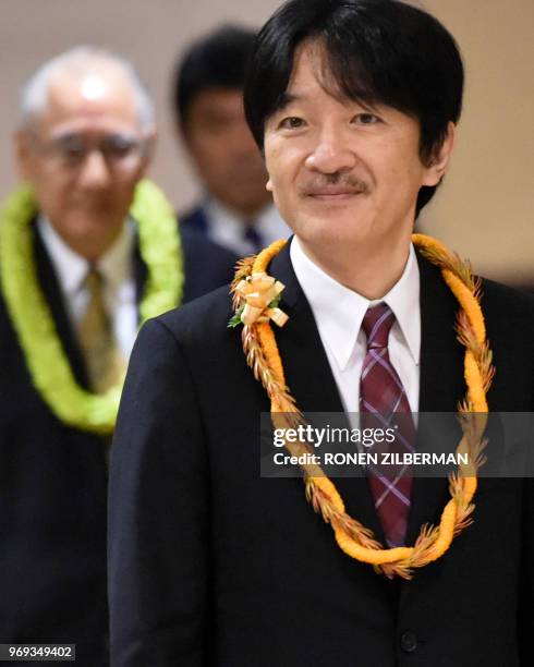 Japanese Prince Akishino looks on at the opening of the 150th anniversary of the Gannemono Symposium in Honolulu, Hawaii, June 6, 2018. - The prince...