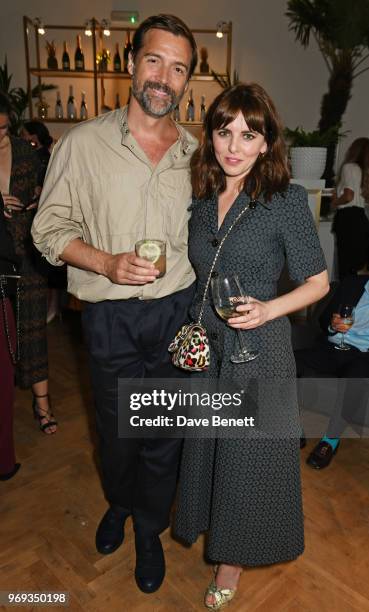 Patrick Grant and Ophelia Lovibond attend the Moet Summer House VIP launch night on June 7, 2018 in London, England.