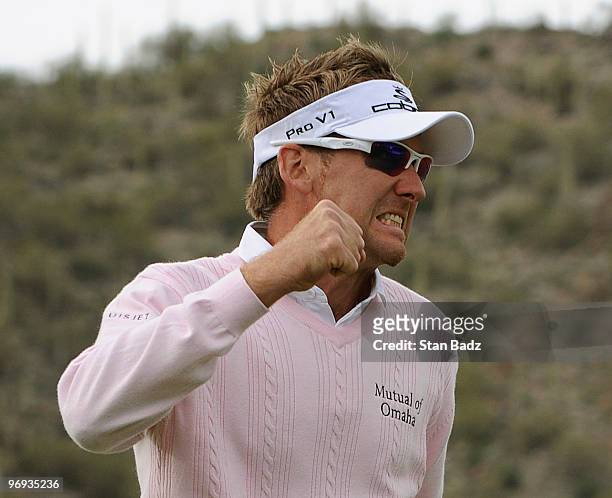 Ian Poulter of England reacts to his win at the 16th green during the final round of the World Golf Championships-Accenture Match Play Championship...