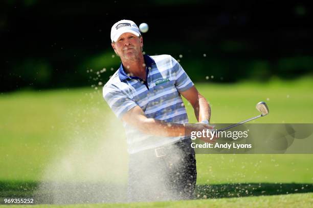 Steve Stricker plays a shot from a bunker on the tenth hole during the first round of the FedEx St. Jude Classic at TPC Southwind on June 7, 2018 in...