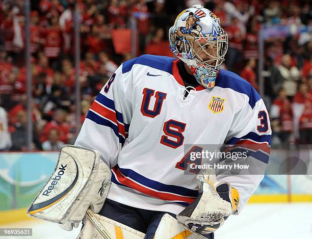 Goalie Ryan Miller of the United States looks on during warm ups against the ice hockey men's preliminary game between Canada and USA on day 10 of...