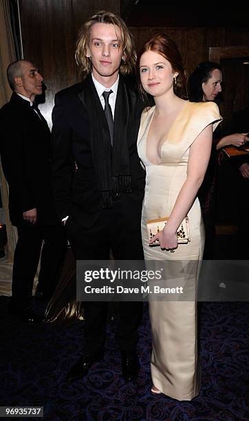 Jamie Campbell Bower and Bonnie Wright arrive for the dinner following the Orange British Academy Film Awards 2010, at The Grosvenor House Hotel on...