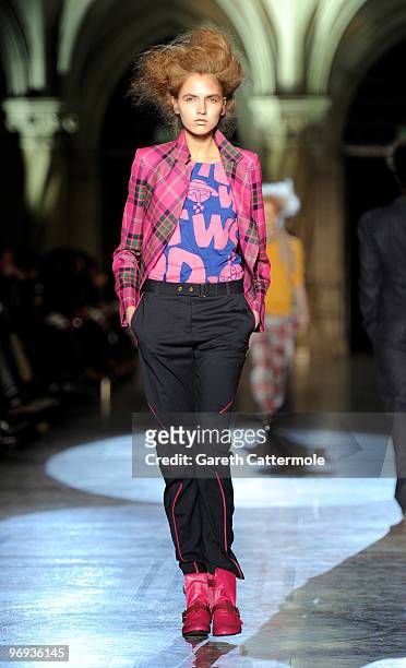 Model walks down the catwalk during the Vivienne Westwood Red Label fashion show during London Fashion Week on February 21, 2010 in London, England.