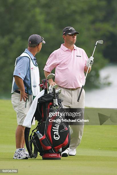 Cameron Beckman stands by his bag on the eighth hole during the final round of the Mayakoba Golf Classic at El Camaleon Golf Club held on February...