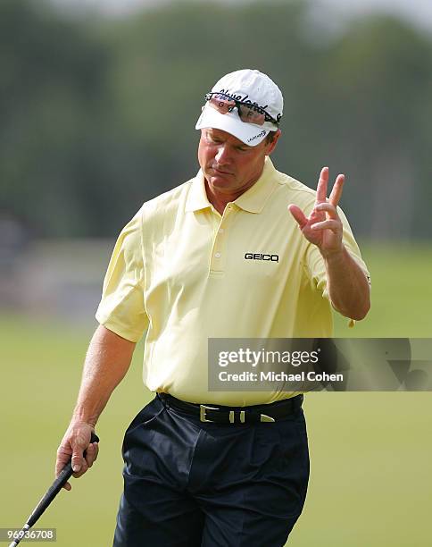 Joe Durant acknowledges the gallery on the 12th green during the final round of the Mayakoba Golf Classic at El Camaleon Golf Club held on February...