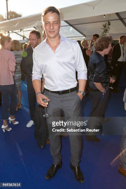 Actor Tom Wlaschiha attends the summer party 2018 of the German Producers Alliance on June 7, 2018 in Berlin, Germany.