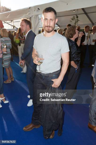 Actor Clemens Schick attends the summer party 2018 of the German Producers Alliance on June 7, 2018 in Berlin, Germany.