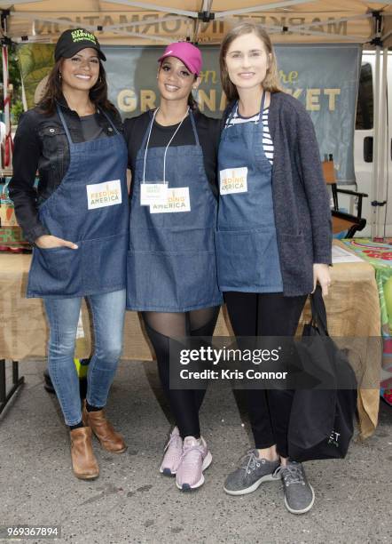 Andrea Navedo, Dascha Polanco and Lauren Bush Lauren participate in the "Feeding America's Celebrity Friends Join City Harvest At GrowNYC's Union...
