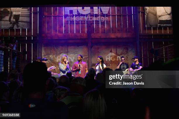 S Suzanne Alexander, DeRon Jenkins and Page Turner of Flip or Flop Nashville speak onstage in the HGTV Lodge at CMA Music Fest on June 7, 2018 in...