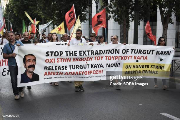 Kurds seen holding banner and Kurdistan flags during the demonstration. Hundreds of people took part in a demonstration to request freedom for the...