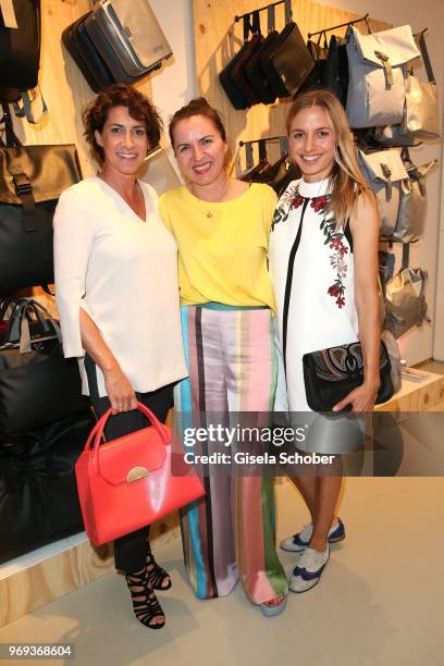 Alice Krueger, wife of Hardy Krueger jr., Director Justina Rokita and Annika Blendl during the Bree 'Urban Showroom' store opening on June 7, 2018 in...