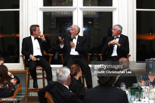 Mark Nicholas asks questions to Sir Trevor Brooking and Ray Clemence at the PCA Lord's Long Room Dinner at Lord's Cricket Ground on June 7, 2018 in...