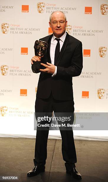 Barry Ackroyd poses with the Cinematography Award for The Hurt Locker during the The Orange British Academy Film Awards 2010, at The Royal Opera...