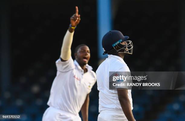 Angelo Mathews of Sri Lanka dismiss by Jason Holder of West Indies during day 2 of the 1st Test between West Indies and Sri Lanka at Queen's Park...