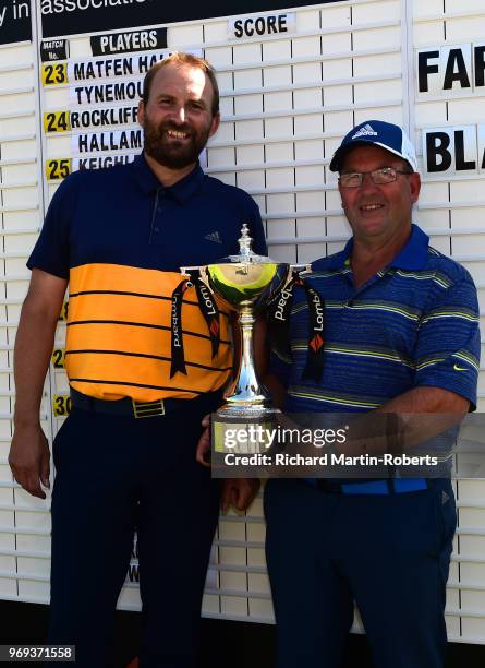 Darren Lent and Amateur John Fawcet of Far Grange Golf Club pose together with the trophy after recording the lowest score during the Lombard Trophy...