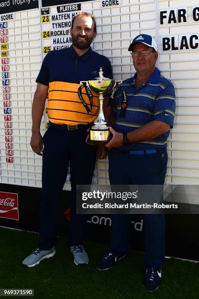 Darren Lent and Amateur John Fawcet of Far Grange Golf Club pose together with the trophy after recording the lowest score during the Lombard Trophy...