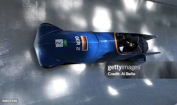 Germany 2 with Thomas Florschuetz and Richard Adjei of Germany compete during the Two-Man Bobsleigh Heat 3 on day 10 of the 2010 Vancouver Winter...