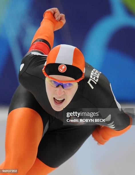 Ireen Wust of the Netherlands competes in the women's 2010 Winter Olympics 1,500m speedskating event at the Olympic Oval in Richmond, outside...