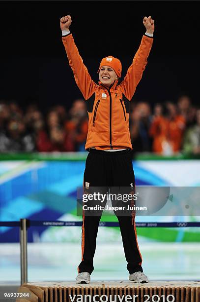 Ireen Wust of Netherlands celebrates winning the gold medal during the medal ceremony for the women's 1500 m speed skating on day 10 of the Vancouver...