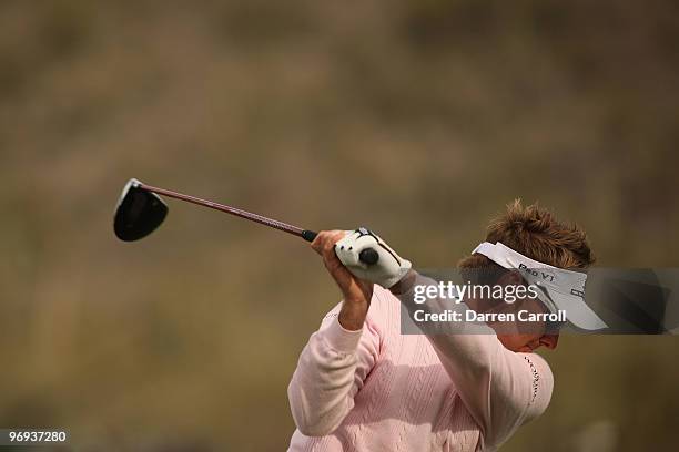 Ian Poulter of England plays a shot on the 16th hole during the final round of the Accenture Match Play Championship at the Ritz-Carlton Golf Club at...