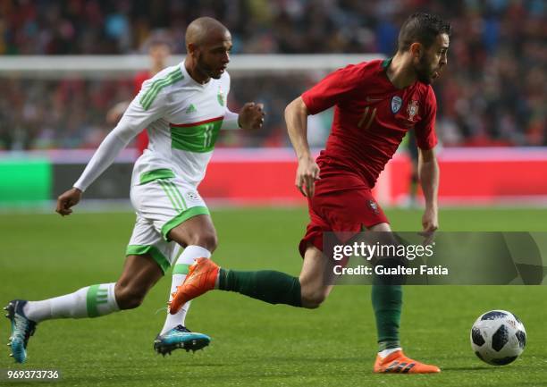 Portugal and Manchester City midfielder Bernardo Silva with Algeria and FC Porto forward Yacine Brahimi in action during the International Friendly...