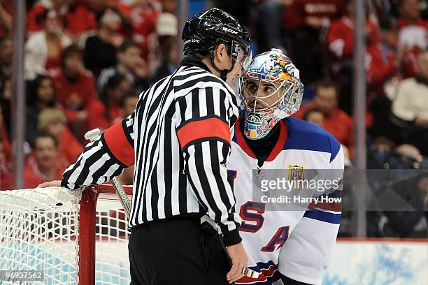 Goalkeeper Ryan Miller of the United States speaks to the referee during the ice hockey men's preliminary game between Canada and USA on day 10 of...