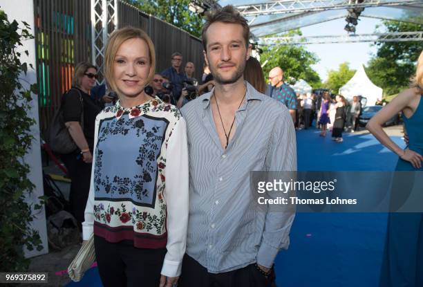Katja Flint and her son Oscar Lauterbach attend the summer party 2018 of the German Producers Alliance on June 7, 2018 in Berlin, Germany.