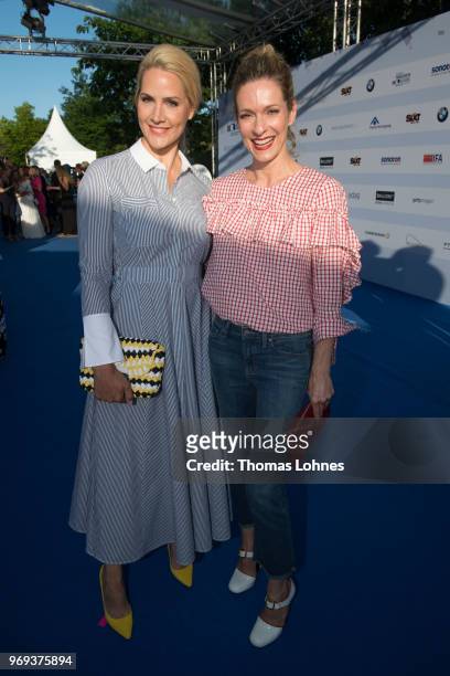 Judith Rakers and Lisa Martinek attends the summer party 2018 of the German Producers Alliance on June 7, 2018 in Berlin, Germany.