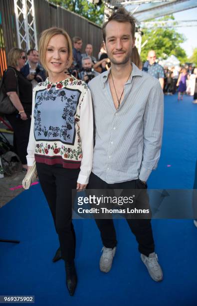 Katja Flint and her son Oscar Lauterbach attend the summer party 2018 of the German Producers Alliance on June 7, 2018 in Berlin, Germany.