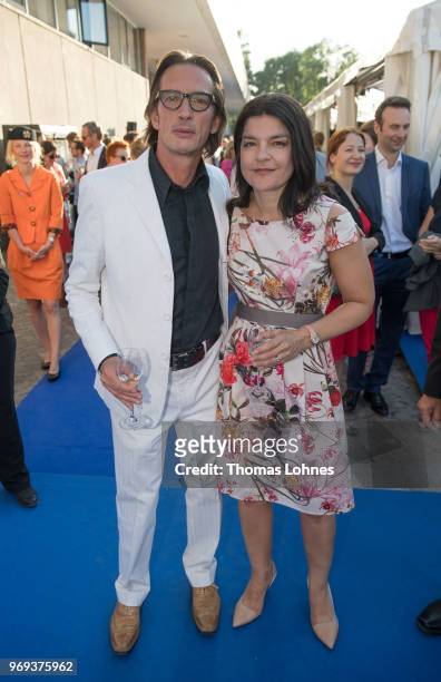 Oskar Roehler and Jasmin Tabatabai attend the summer party 2018 of the German Producers Alliance on June 7, 2018 in Berlin, Germany.