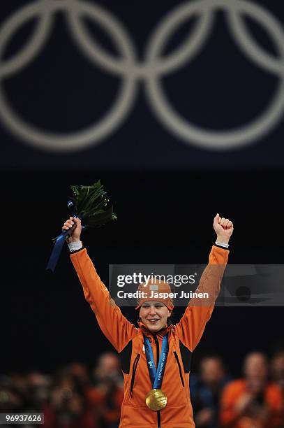 Ireen Wust of Netherlands celebrates winning the gold medal during the medal ceremony for the women's 1500 m speed skating on day 10 of the Vancouver...