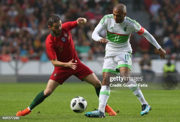 Algeria and FC Porto forward Yacine Brahimi with Portugal and Manchester City midfielder Bernardo Silva in action during the International Friendly...