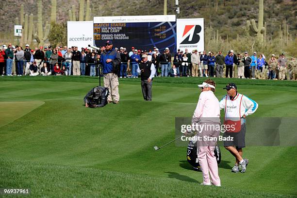 Ian Poulter of England chips onto the 10th green during the final round of the World Golf Championships-Accenture Match Play Championship at The...