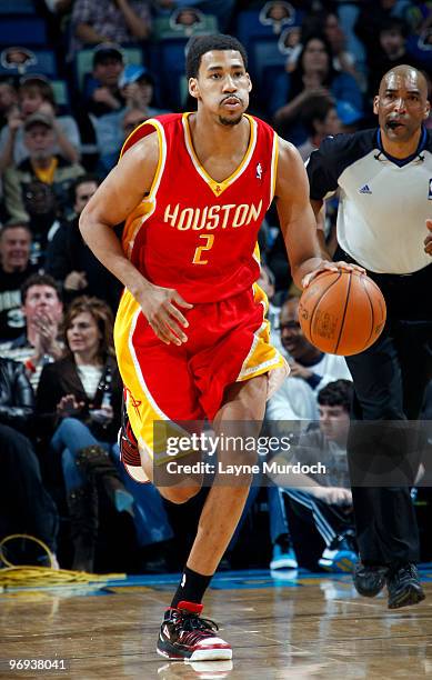 Garrett Temple of the Houston Rockets drives against the New Orleans Hornets on February 21, 2010 at the New Orleans Arena in New Orleans, Louisiana....
