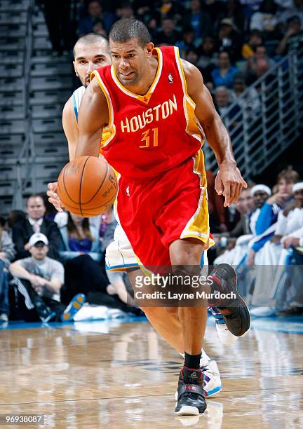Shane Battier of the Houston Rockets drives past Peja Stojakovic of the New Orleans Hornets on February 21, 2010 at the New Orleans Arena in New...