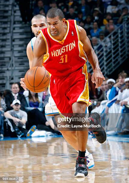 Shane Battier of the Houston Rockets drives past Peja Stojakovic of the New Orleans Hornets on February 21, 2010 at the New Orleans Arena in New...