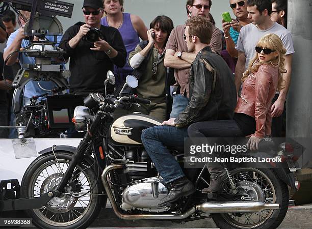 Actor Cam Gigandet and singer and actress Christina Aguilera film on location for "Burlesque" on January 11, 2010 in Los Angeles, California.
