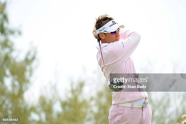 Ian Poulter of England hits a drive during the final round of the World Golf Championships-Accenture Match Play Championship at The Ritz-Carlton Golf...
