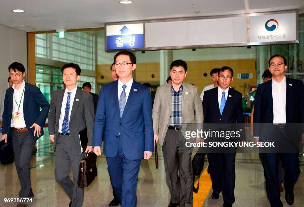 South Korea's Vice Unification Minister Chun Hae-sung and other officials leave for North Korea to attend the opening of a liaison office in the...