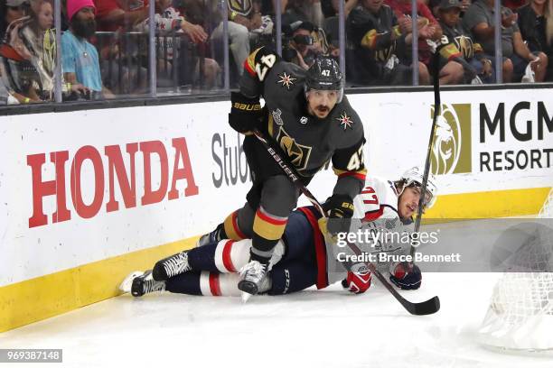 Luca Sbisa of the Vegas Golden Knights skates against John Carlson of the Washington Capitals during the first period in Game Five of the 2018 NHL...