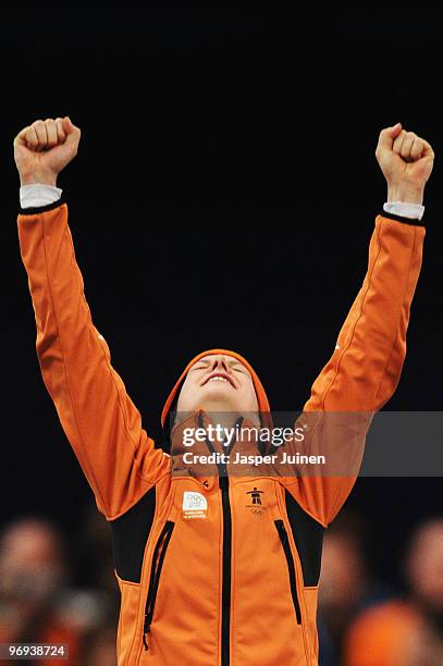 Ireen Wust of Netherlands celebrates winning the gold medal during the medal ceremony for the women's 1500 m speed skating on day 10 of the Vancouver...