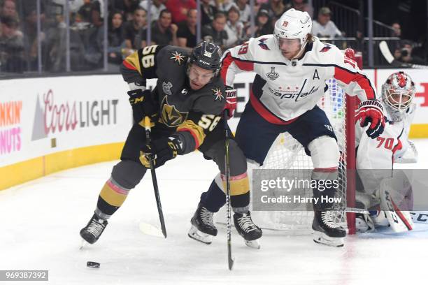 Erik Haula of the Vegas Golden Knights is defended by Nicklas Backstrom of the Washington Capitals during the first period in Game Five of the 2018...