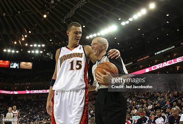 Andris Biedrins of the Golden State Warriors talks with referee Dick Bavetta during an NBA game at Oracle Arena at Oracle Arena on February 21, 2010...
